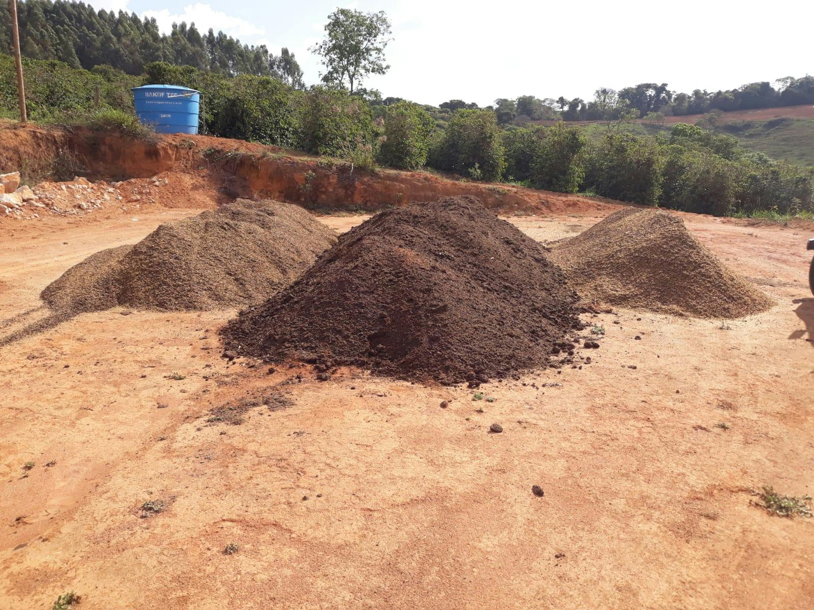 Piles of coffee husk and cow manure